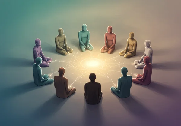 A diverse group of people sitting together and having a supportive conversation.